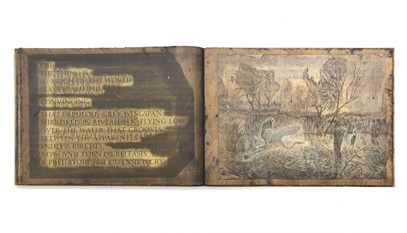 A page from the artist's book "Hold" by Sally Ball and Jan Vicar with the text "So much of the world stays beautiful."